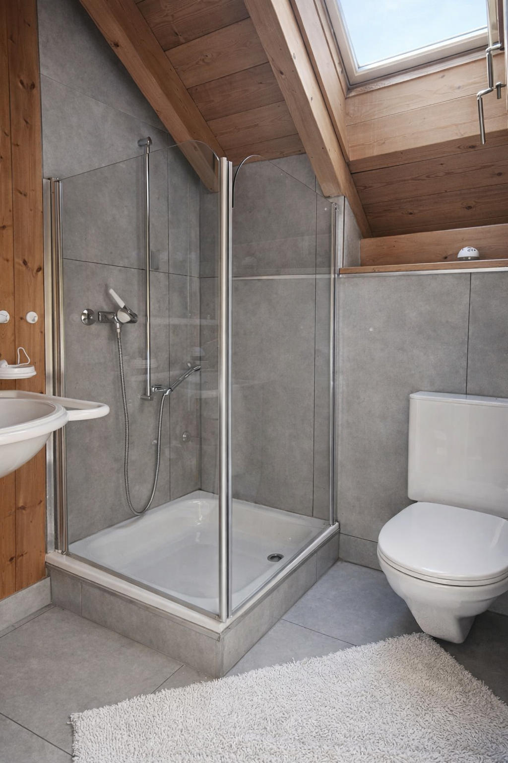Serene bathroom under wooden ceiling Serene bathroom under wooden ceiling